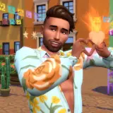 Sympatyczny Sim z gry **Woohoo Sims 4** tworzy serce z dłoni, emanując radością i miłością na tle kolorowej uliczki.