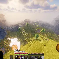 Widok z góry na dolinę w grze Minecraft. Gracz, Pepin, stoi na zboczu, a przed nim rozciąga się krajobraz z drzewami i budowlami. To lepsze mc!