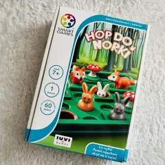 Gra logiczna "Hop do norki" od Smart Games. Pomóż zajączkom ukryć się przed lisem, rozwiązując 60 zadań.