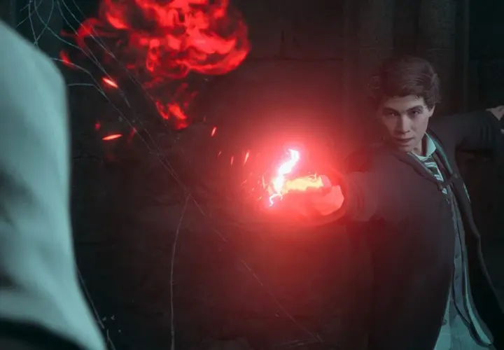 Uczeń Hogwartu w grze Hogwarts Legacy rzuca zaklęcie, które wygląda jak Avada Kedavra.
