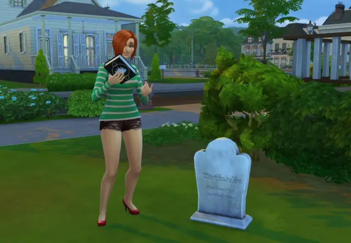 Simka z książką przy grobie, jakby szukała kod na darmowe domy The Sims 4.