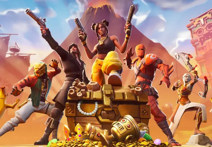 Postacie z gry Fortnite przy skrzyni pełnej skarbów. Idealne darmowe gry na PS4 dla fanów akcji i przygód.