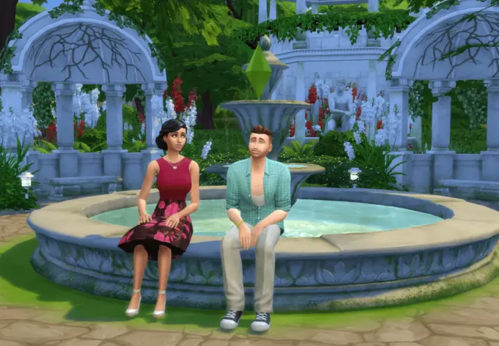 Para dowiedzieć się, jak zmienić relacje między simami w The Sims 4, zobacz tę parę siedzącą przy fontannie w ogrodzie.