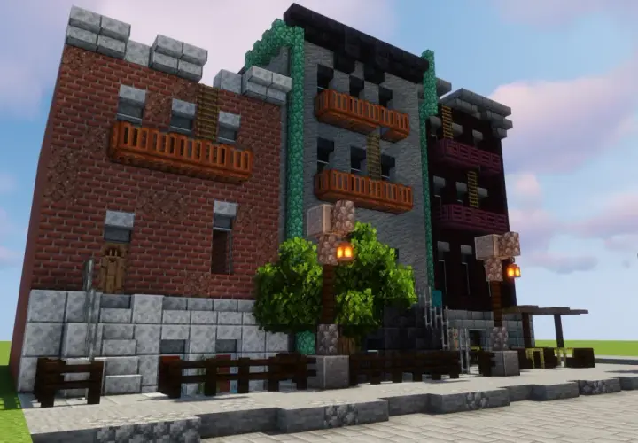 Budynki w stylu Minecraft, z cegły i kamienia, z balkonami i latarniami. Wspaniały przykład architectury mod.