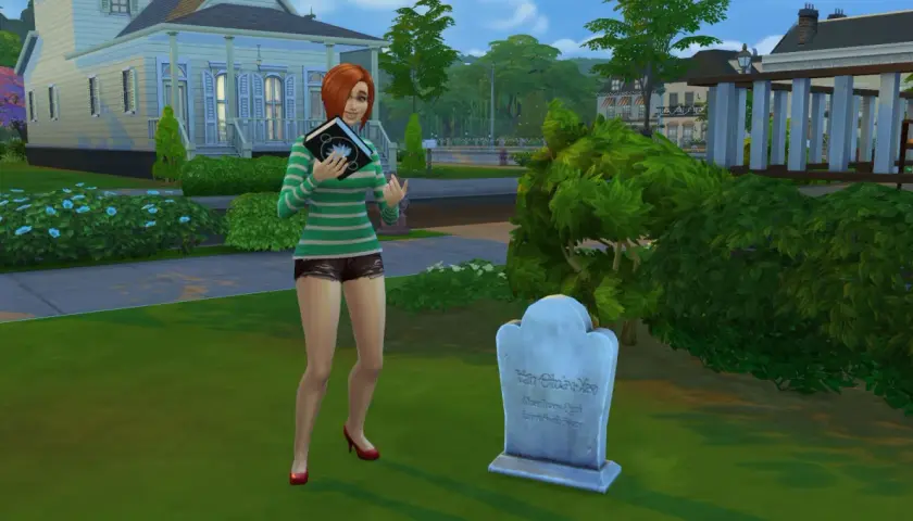 Simka z książką przy grobie, jakby szukała kod na darmowe domy The Sims 4.