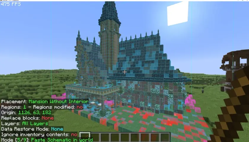 Szkielet rezydencji w Minecraft, widoczny jako litematica schematic, z niebieskimi obrysami bloków.