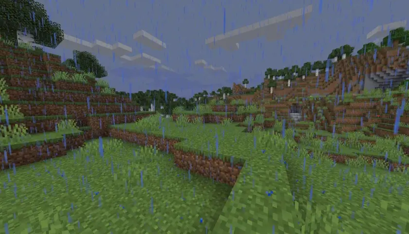 Deszczowy krajobraz w Minecraft. Chcesz wiedzieć, jak zmienić pogodę w MC? Wystarczy wpisać komendę `/weather clear`.