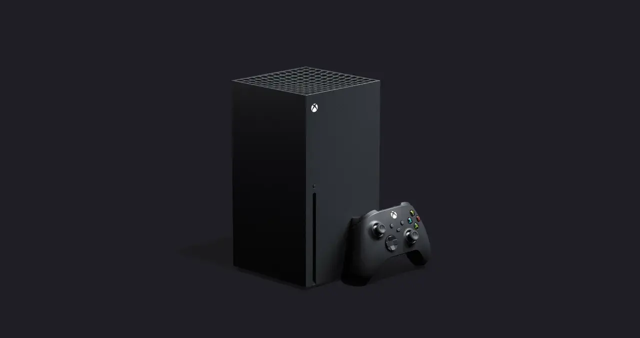 Czarna konsola Xbox Series X i kontroler na ciemnym tle. Premiera nowej generacji gier.