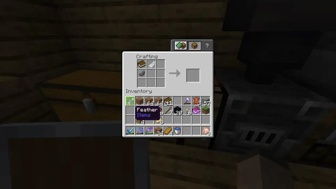 Jak zrobic ksiazke z piorem w MC: crafting book and feather. W ekwipunku masz pióro i skórę, potrzebne do stworzenia księgi.